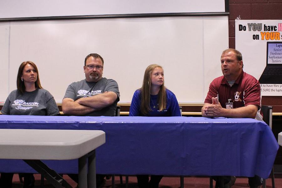 Russell signs with Barton for soccer