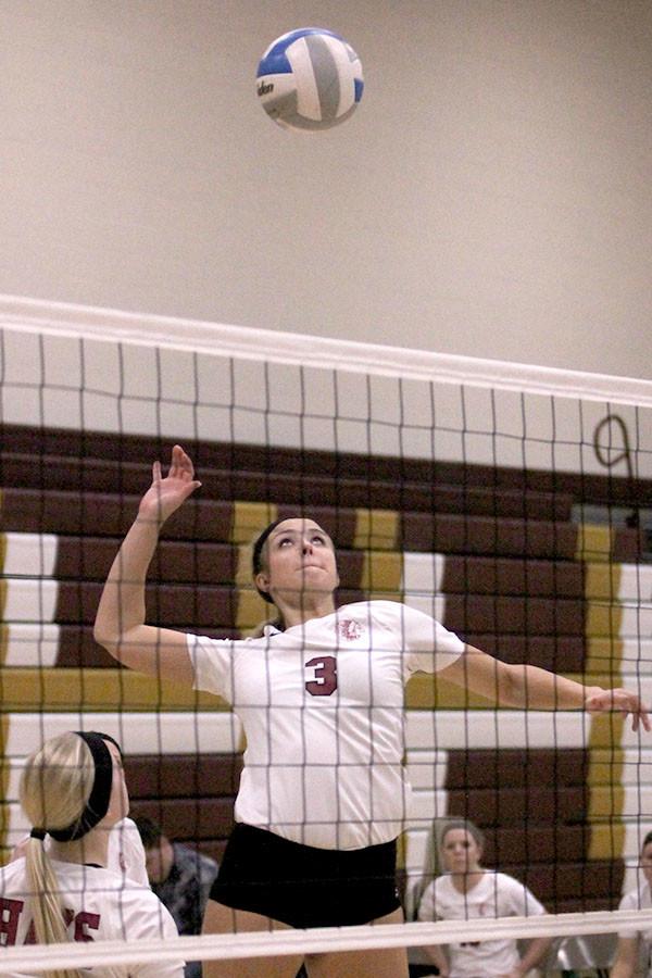 Senior Morgan Klaus goes up for a spike attempt in recent volleyball action on Oct. 5 at the Hays High gym. The team is now 22-3 on their season.