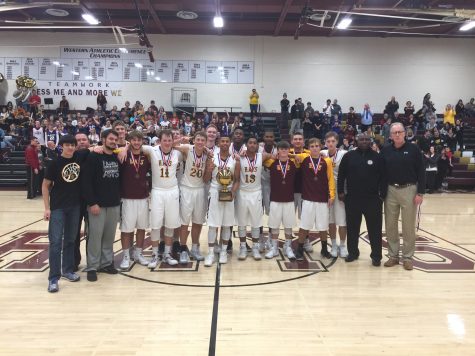 Boys basketball team wins Hays City Shootout