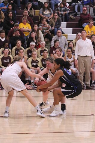 Girls basketball team falls to Liberal Redskins
