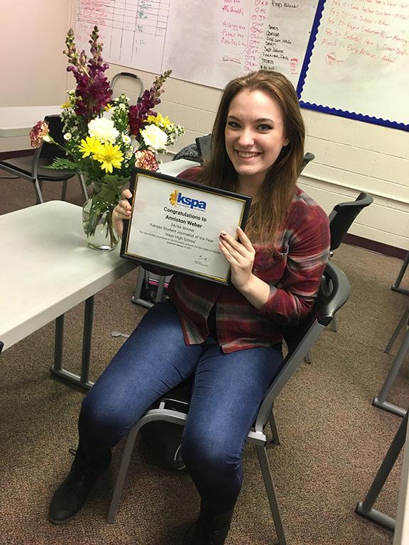 Senior Anniston Weber smiles after just finding out she won the KSPA Student Journalist of the Year award for 3A/4A.