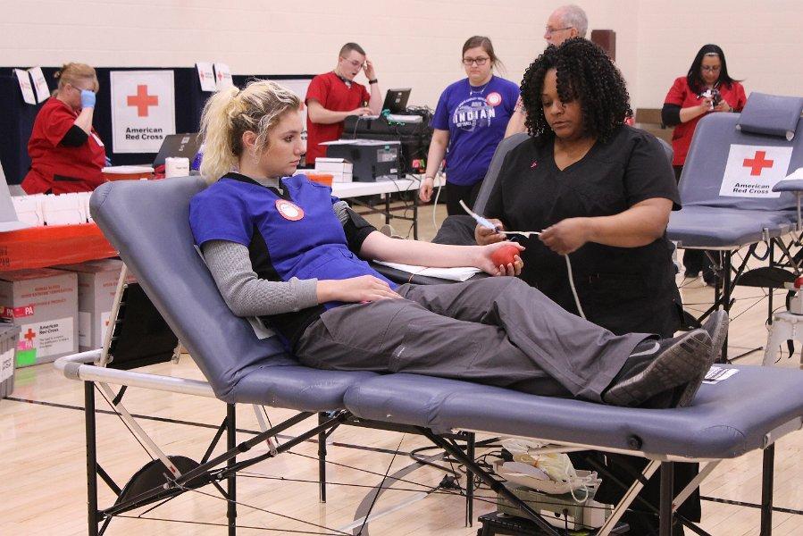 Senior+Leah+Huxman+gives+blood+on+March+7.+This+is+the+second+blood+drive+of+the+year.