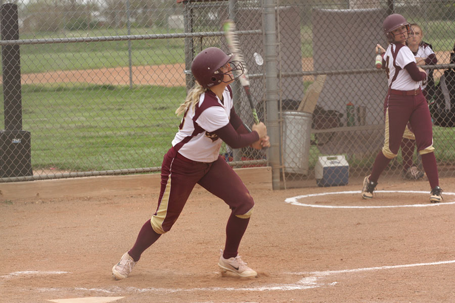 Freshman Macee Altman hits off the Garden City pitcher in the home game against the Buffaloes on April 25.