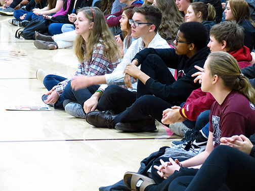 Students look on as its announced that Hays High is the ACT College and Career Transition Exemplar during an assembly on April 5.