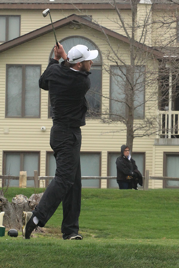 Justin McCullick taking a swing at the Hays Invitational