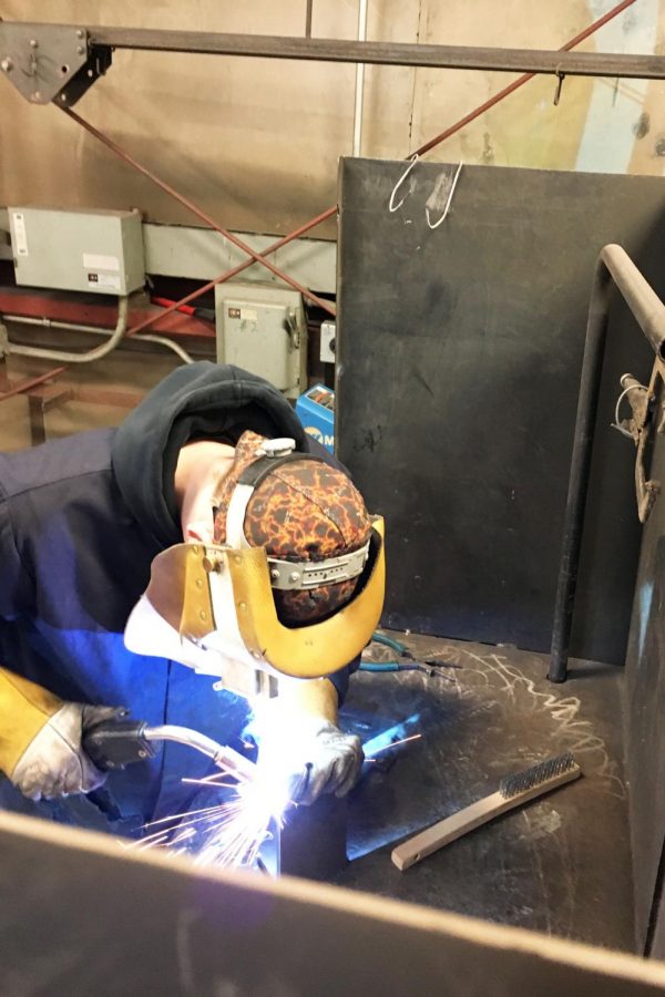 Junior Matthew Fross works on the welding portion of  the competition.  