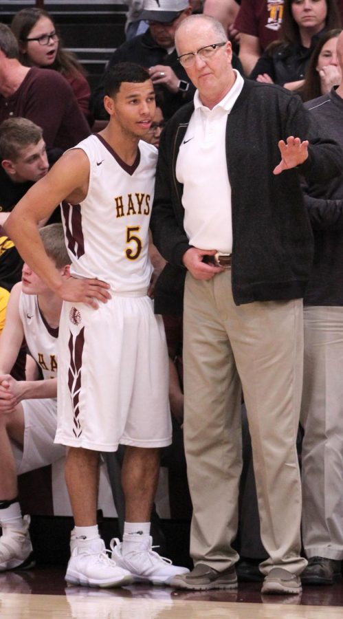 WAC Player of the Year Ethan Nunnery and WAC Coach of the year Rick Keltner discuss a prior play in a recent home game against Salina Central.
