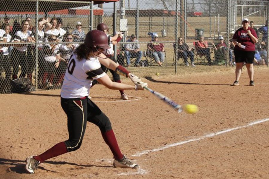 Junior pitcher Jaysa Wichers hitting the ball at home vs Goodland.