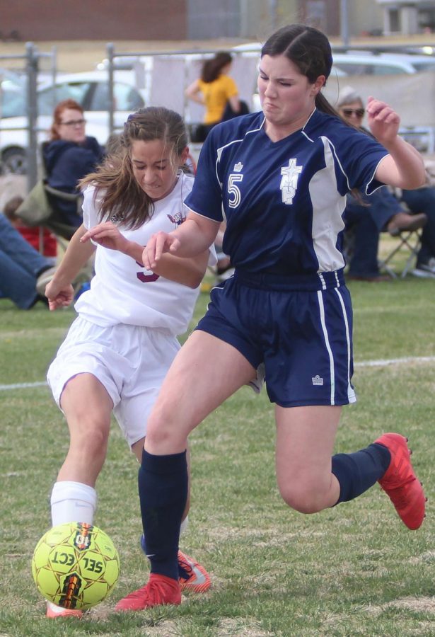 Freshman Allison Shubert fights for the ball against a TMP defender. In a 2-0 victory in recent home game on April 26.