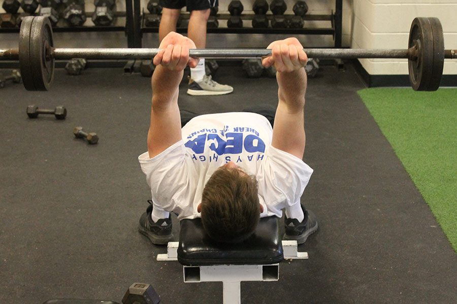 Junior Keaton Markley completing a lift in his G3 weights class. 
