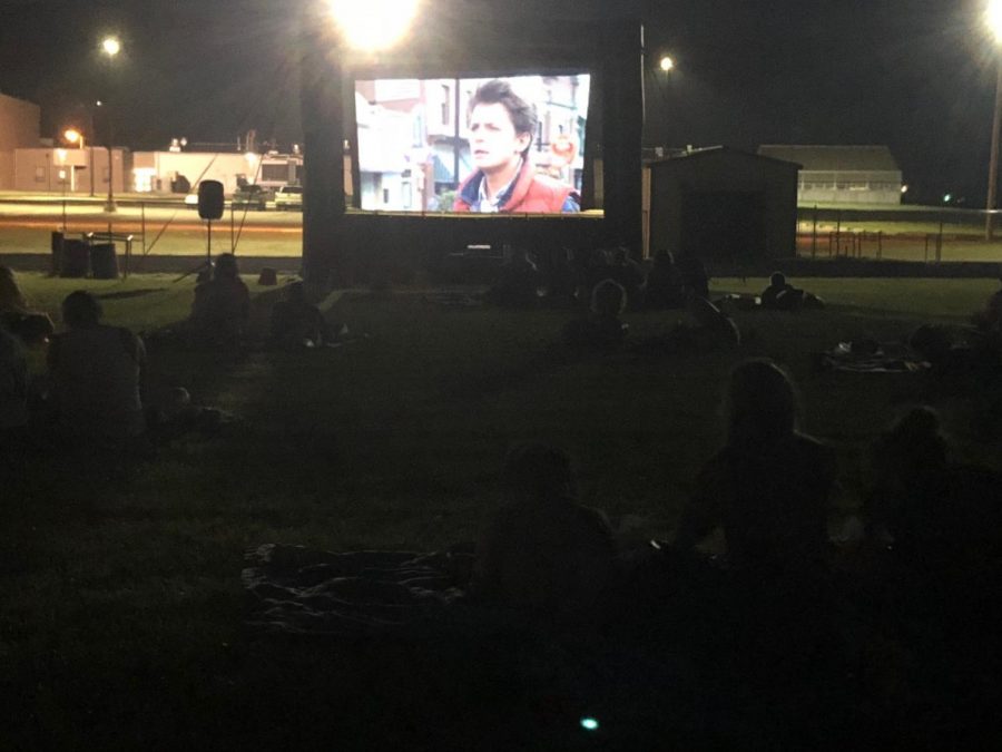 Students watch Back To The Future on the football field after Maroon and Gold. The movie started at 10 p.m. with a $2 admission fee. Around 70 students attended.