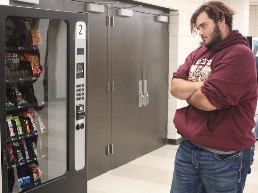 Student is frustrated with the new vending machine rule.