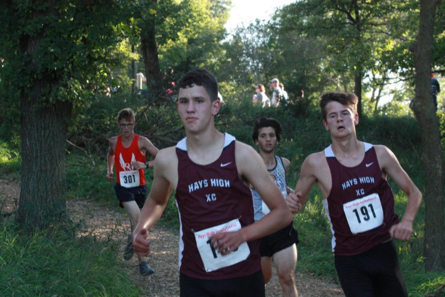 Juniors Grant Brungardt, Connor Cunningham push through the heat to try and defeat other competitors.  