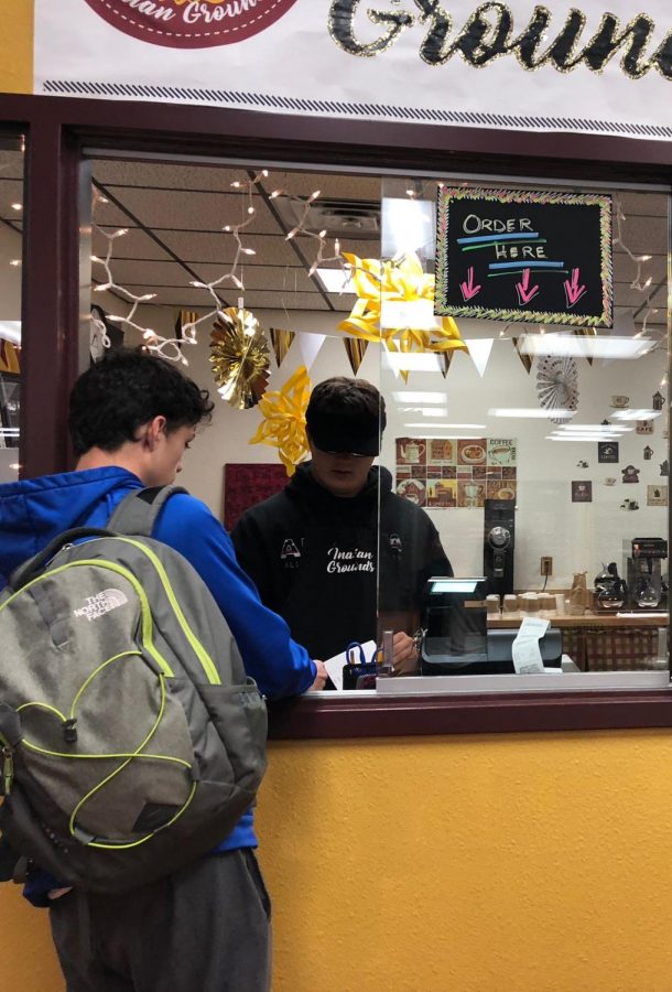 Senior Tanner Hastelhorst takes an order during operating hours. The coffee shop is open on Maroon days from 7:15 to 7:50 a.m.