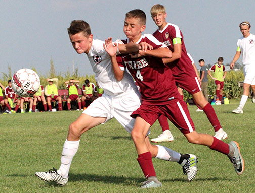 Freshman Chris Goodale fight for possession of the ball against Wichita Classical in a recent home match up. The Indians went on the win 4-2 in this match up.