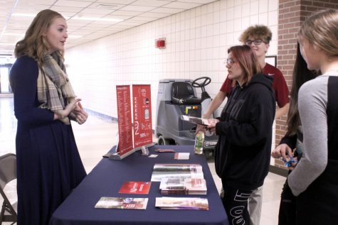 Colleges from all around state travel to high schools to sell their school to students