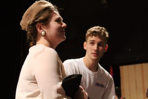 Sophomore Caitlin Leiker and senior Cade Swayne rehearse emotional scene. The two have been cast in two principal character roles. 