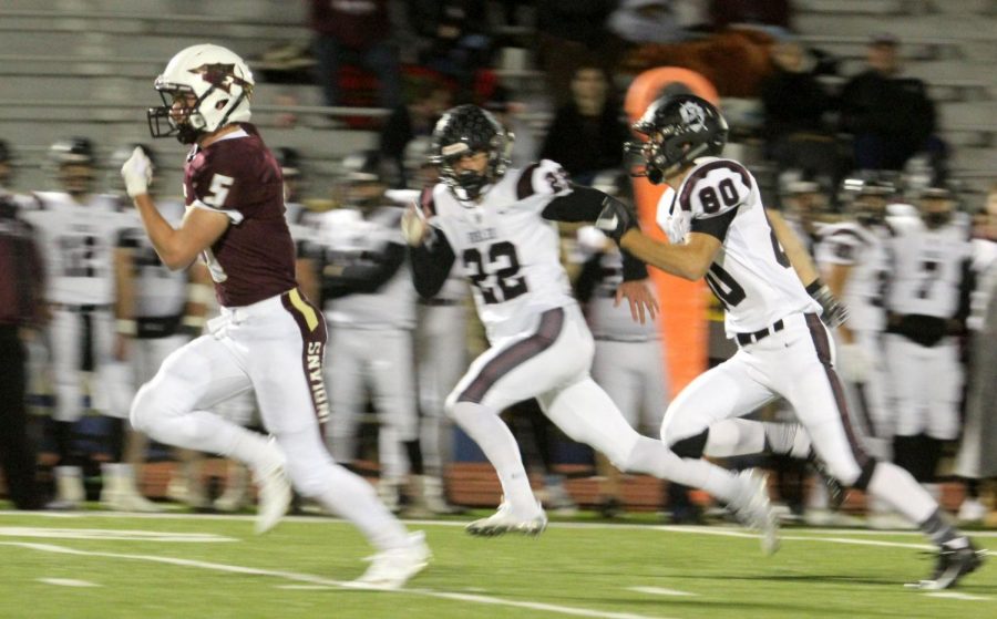Junior Hayden Brown runs for a touchdown in a recent game against Buhler. On October 19, the Indians fell short to the Salina Central Mustangs.