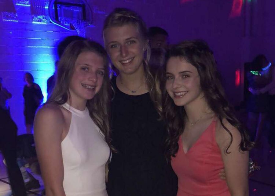 The Robben sisters (left to right) freshman Caroline, junior Isabel and sophomore Maggie go to their first of many high school dances together. 