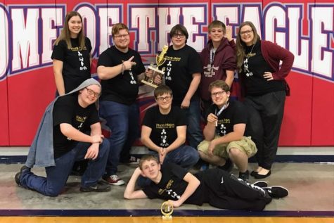 Chess team posing for their third place trophy