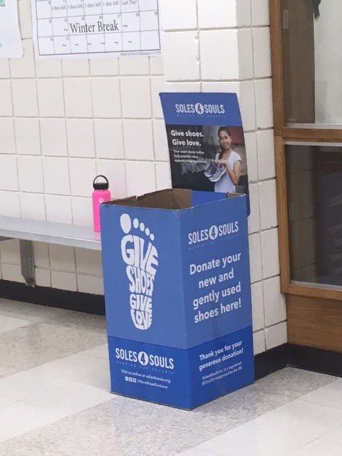 There are two boxes around the school for students to leave shoes in. One is in the gym commons and the other is by the main office.
