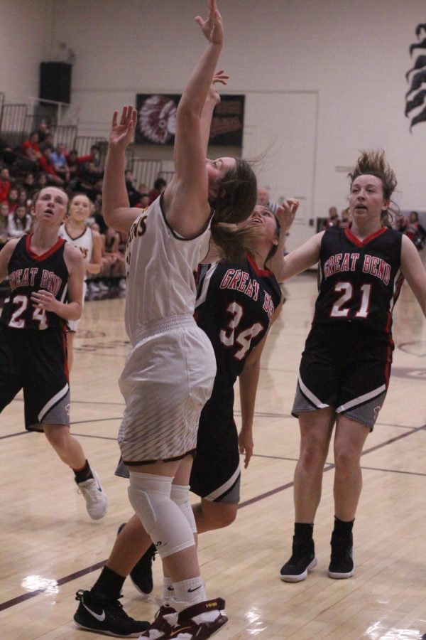 Junior Brooke Denning attempts a basket at a previous game against Colby. The Lady Indians recently won the Colby Invitational which makes their record 8-3 for the season.