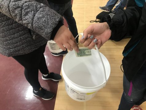 DECA seniors attempt final Miracle Minute for Ronald McDonald House charity