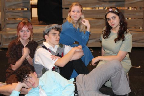 Sophomore Tom Drabkin poses with his musical cast mates.