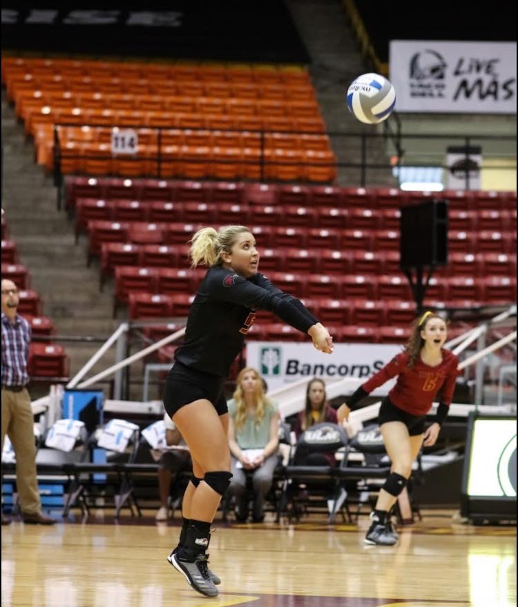 Hays High alumni Albany Schaffer plays in a collegiate volleyball game. Schaffer currently attends the University of Louisiana-Monroe and is majoring in Kinesiology with a minior in sport psychology. 