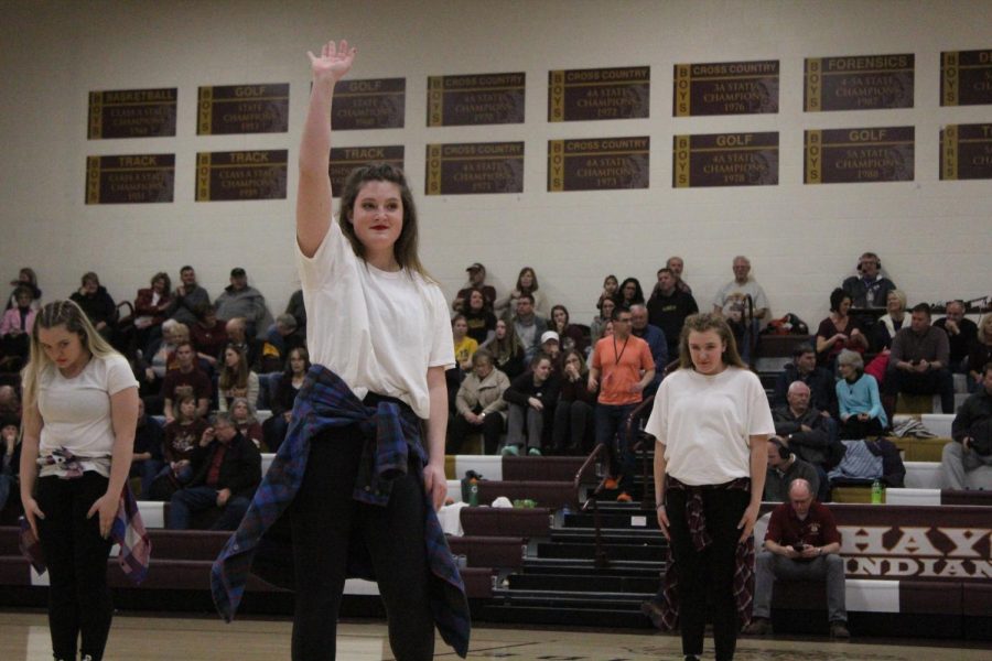 During last seasons senior night, senior Payton Selby waves to the crowd. Dance team auditions for the 2019-2020 school year took place on Thursday, Mar. 21.