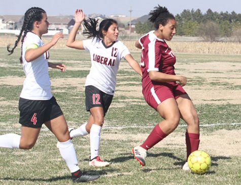 Freshman Taleia McCrae takes shot on Liberal defense after beating two defenders.