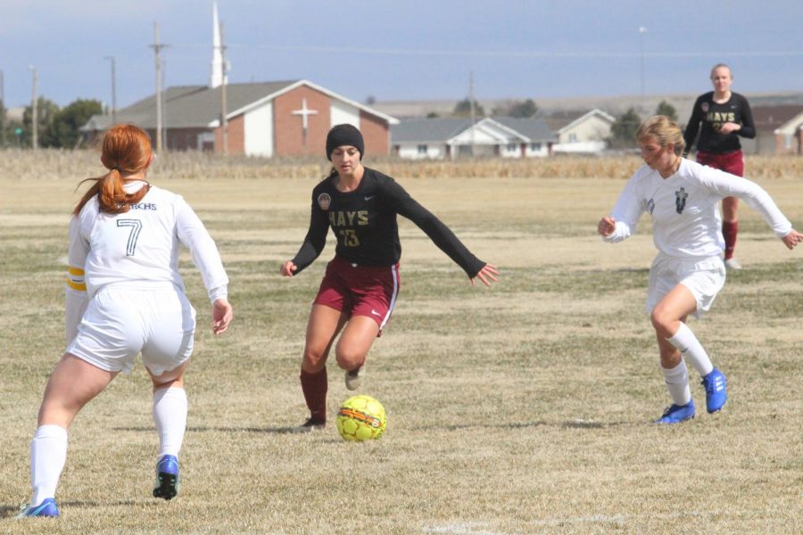 Senior Kallie Leiker dribbles a ball at a previous home game against TMP. The Lady Indian soccer season ended after a 2-1 loss against Valley Center on May 16.