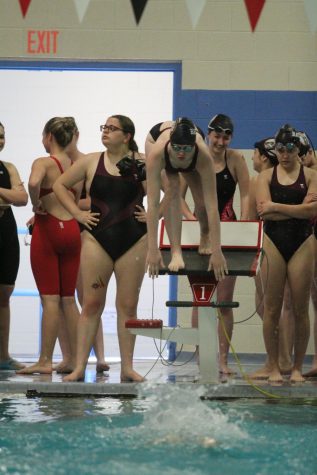 Megan Flavin competes in third state swim meet on May 17