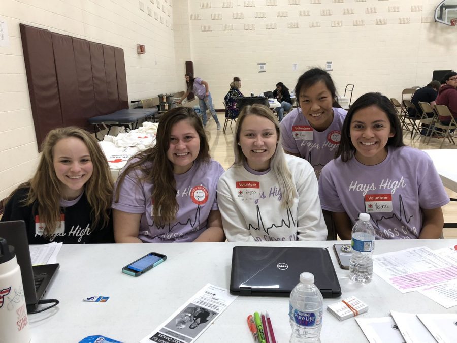 2018-2019 Red Cross Club Officers pose for a picture during a blood drive.  As a Red Cross Club officer, students are required to supervise all  blood drives that take place.