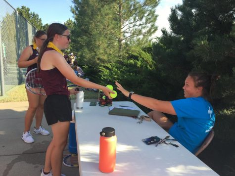 Girls’ tennis competes at home meet
