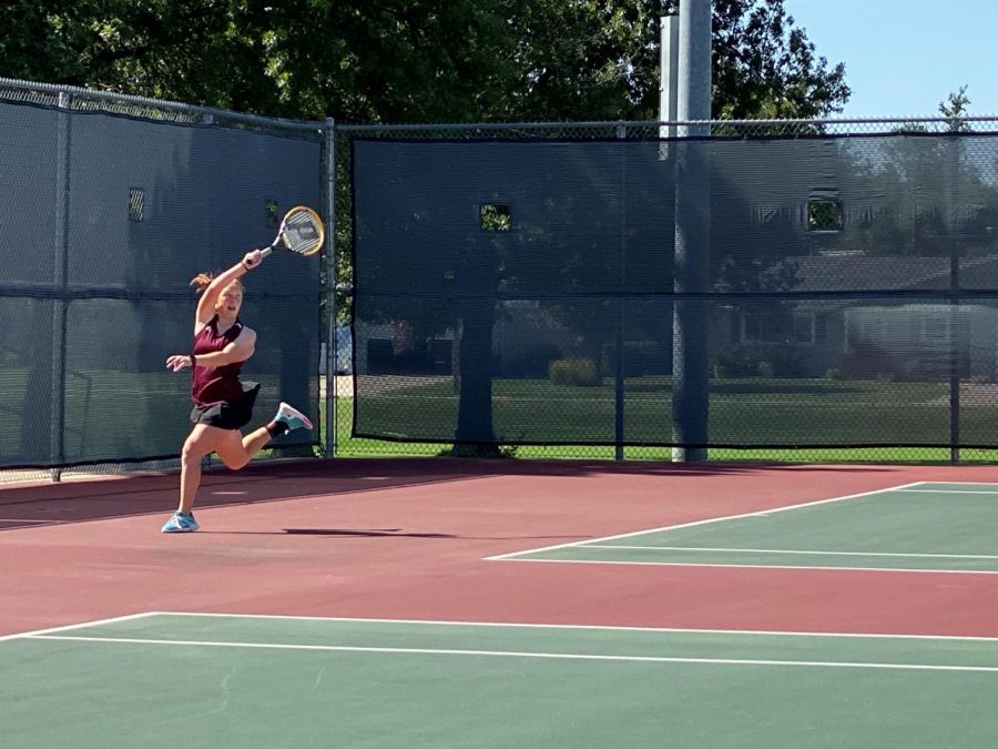 Senior Lynsie Hanson played #1 singles at the meet and placed 8th.