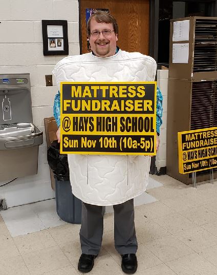 Hays High Band director Matthew Rome promotes the fundraiser. The fundraiser will be held on Nov. 10. 