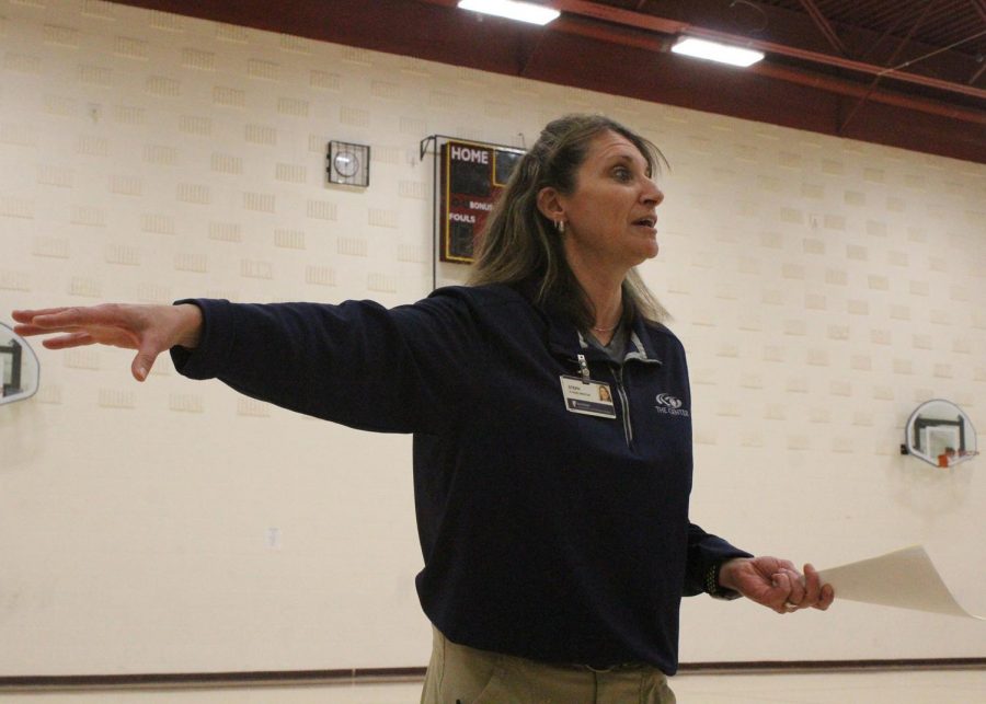 Steph Howie, a group fitness specialist at the Center for Health Improvement, presents to students on Oct. 30.