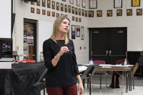 During PRIDE Time, Holly Latham talks to students about being a Kansas Bureau of Investigation the Vocal Room. Latham worked as a KBI Forensics Specialist for 20 years.