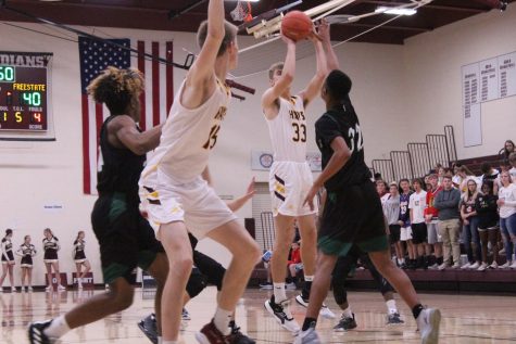 Boys basketball defeats Colby