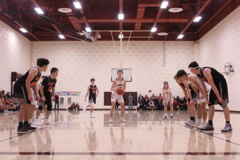 Boys basketball beats Liberal at home
