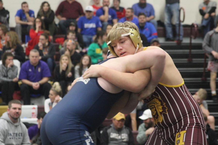 Sophomore+Gavin+Nutting+wrestles+at+the+Bob+Kuhn+Tournament+on+Jan.+25+at+Hays+High.+At+state%2C+Nutting+finished+in+fifth+place+in+his+weight+division.