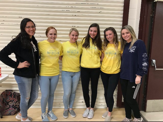 Red Cross Club officers pose for a picture during the Blood Drive on March 5. Officers volunteered for the entirety of the drive along with instructor Erin Deenihan.