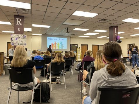 The freshmen class of G1 during the Bystander Intervention for Jana's Campaign in the library.