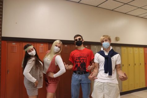 Seniors Mylah Potter, Kaitlyn Suppes, Jason Krannawitter, and Nicolas Park dress up for Guys in Ties/Girls in Pearls on Friday.