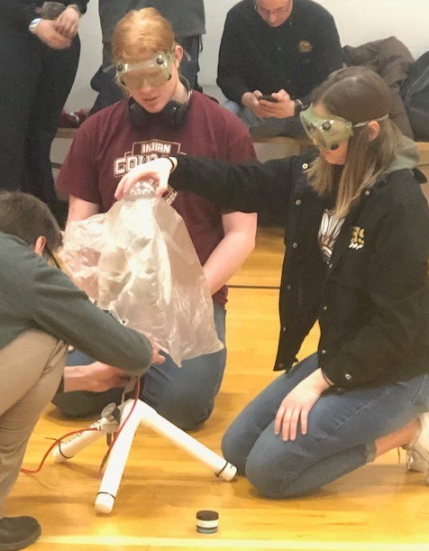 A 2019-2020 team from Science Olympiad sets up their project. 