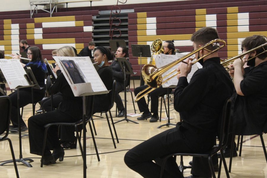 Members of the band perform during one of their few concerts this school year due to the pandemic. They have had to be more careful about practicing and being around one another, also due to the pandemic.