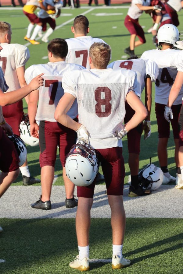 Senior Jordan Dale observes from the sideline as his defense participates in the Maroon and Gold Scrimmage. Dale came on as quarterback for senior Jaren Kanak in the fourth quarter. 