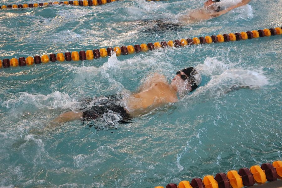 Boys swim competes at Topeka West