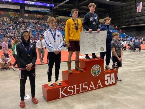 Sophomore Harley Zimmerman stands on the podium after receiving second place at state.